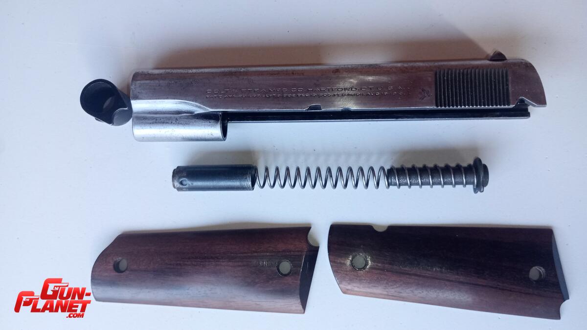 Colt Corredera de 1911 cal 45 y extras