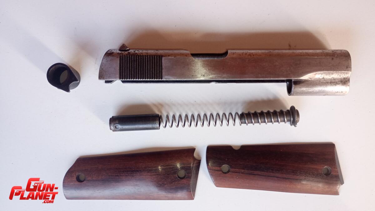 Colt Corredera de 1911 cal 45 y extras
