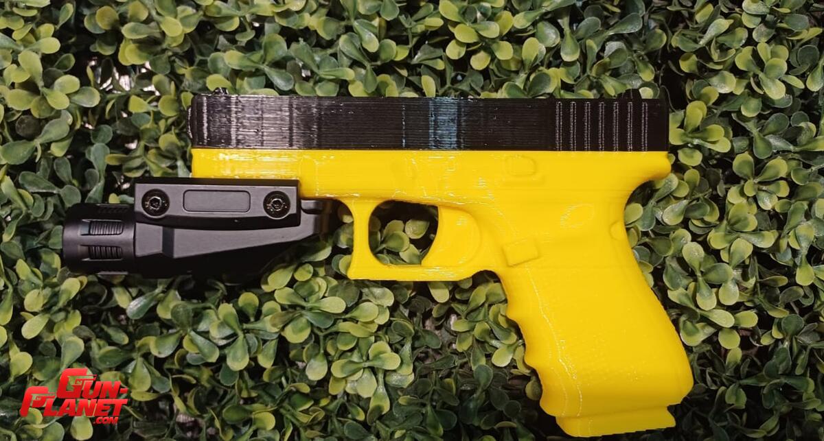  Linterna tactica para arma corta