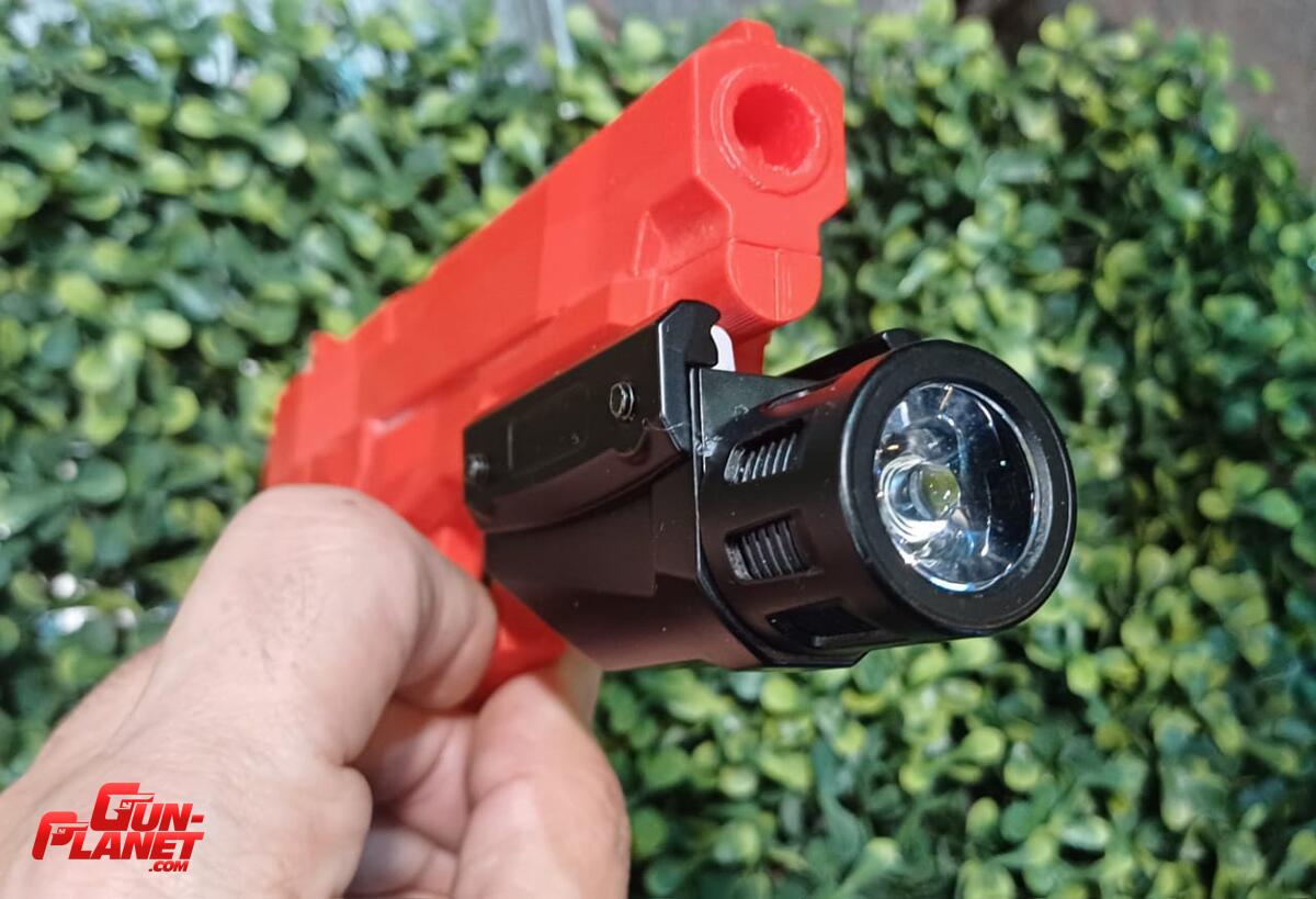  Linterna tactica para arma corta