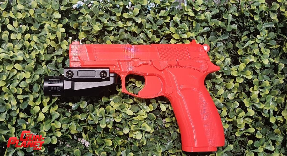  Linterna tactica para arma corta