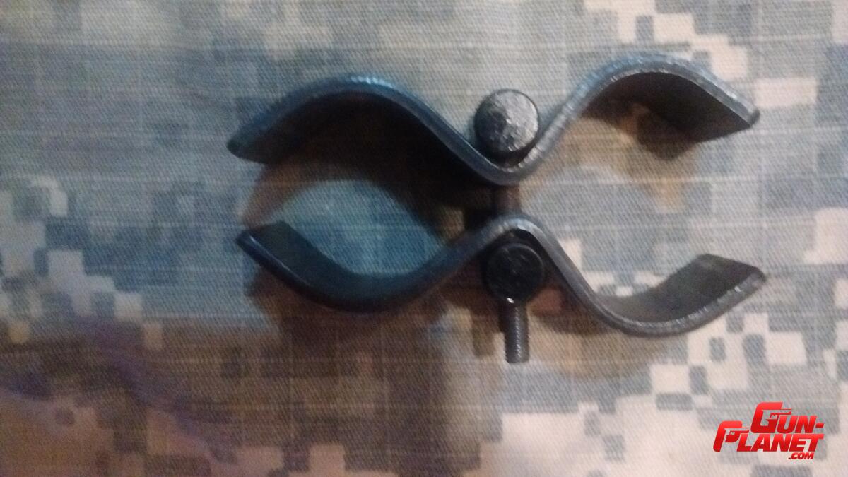  Mordaza (clamp) para caño/almacen de escopeta 